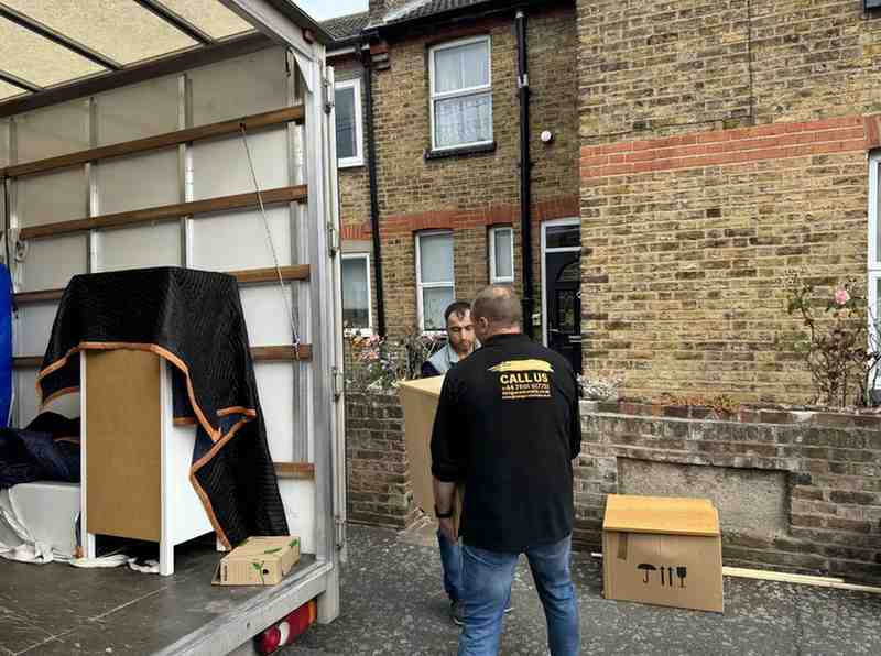 Flat Removals London 3 2 people are helping clients for flat removals in London