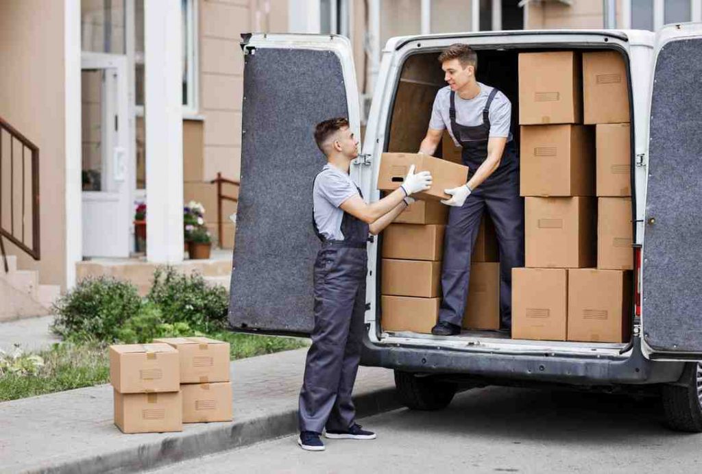 Removals Ealing 2 2 young handsome movers helping clients for Removals Ealing